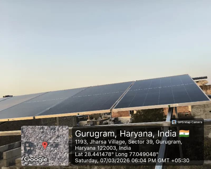 Voltmen technicians assembling solar mounting rails on a Gurgaon rooftop